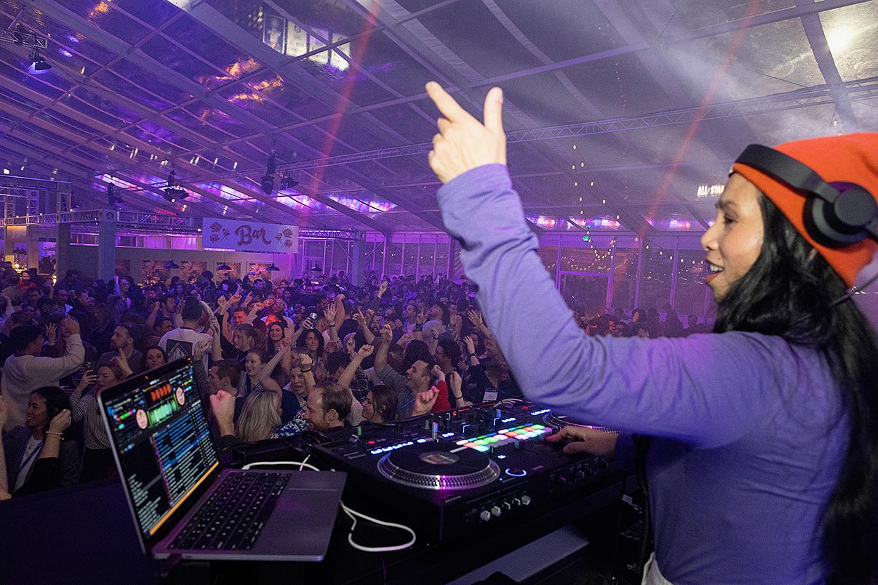 dance crowd and DJ at event