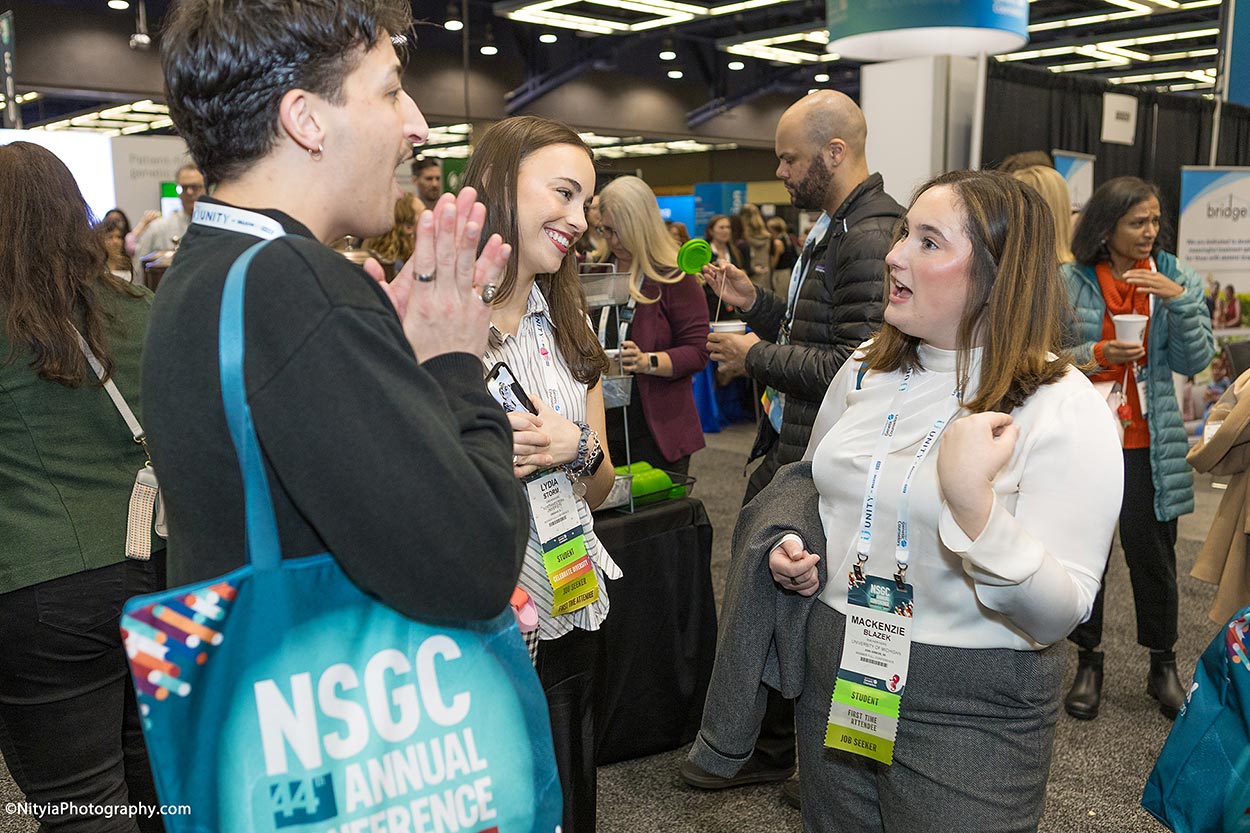 Conference attendees networking in exhibit hall