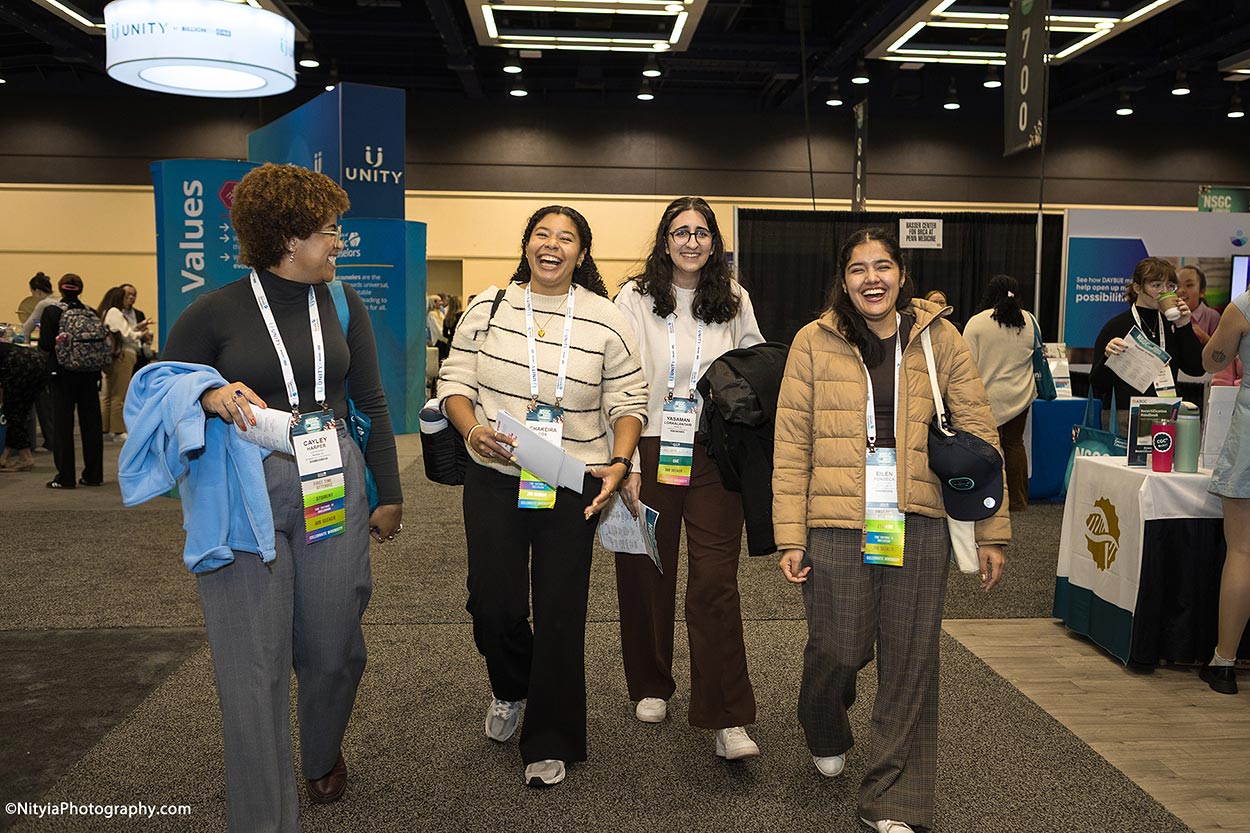 Group of conference attendees in exhibit hall, Seattle Convention Center